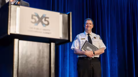 5x5 Award Ceremony Recipient on Stage