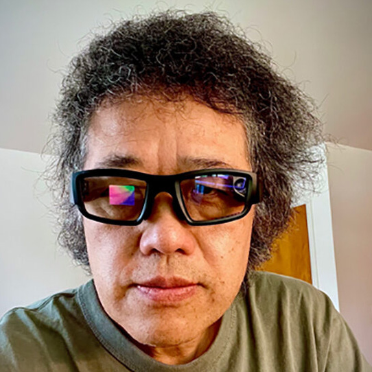 Headshot of Yang Cai.